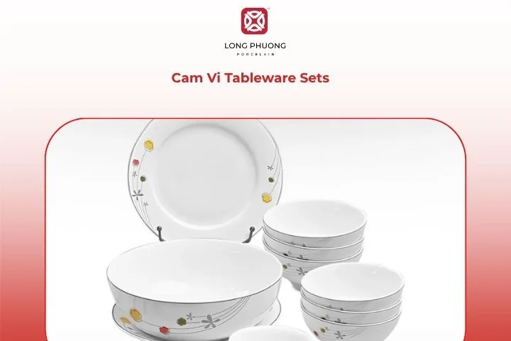 Cam Vi set with orange flower accents glowing under soft lighting, bringing warmth and joy to every meal