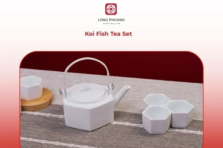 Koi Fish Tea Set – elegant white porcelain teapot and cups featuring graceful koi fish motifs