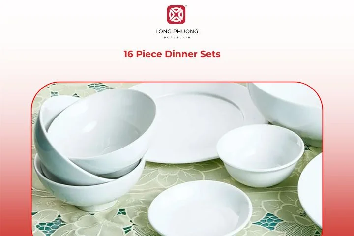 16 Piece Dinner Set laid out across a large table, featuring glossy porcelain with gentle curves and coordinated serving pieces.