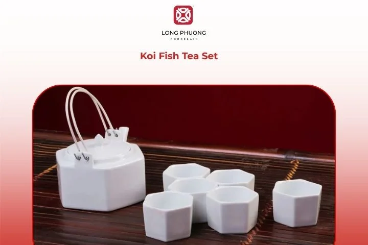 Koi Fish Tea Set placed on a rustic tea table with blooming flowers and antique décor