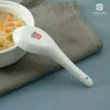 white porcelain spoon